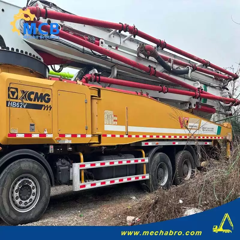 Original Mechabro field photo of the 2021 XCMG pump truck 62m, showing its folded boom, pump body and rear chassis