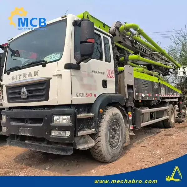 Used concrete pump truck chassis inspection shown in a Mechabro product-catalog photo of a Zoomlion 38m pump truck on a SITRAK chassis