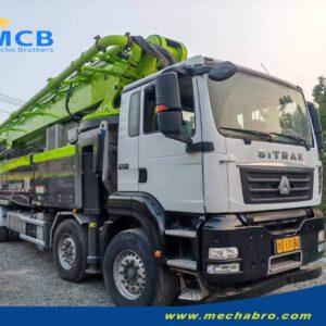 2022 Zoomlion 61.2m SITRAK pump truck — front-right view 2022 Zoomlion 61.2m concrete pump truck on SITRAK C7H chassis, front-right view