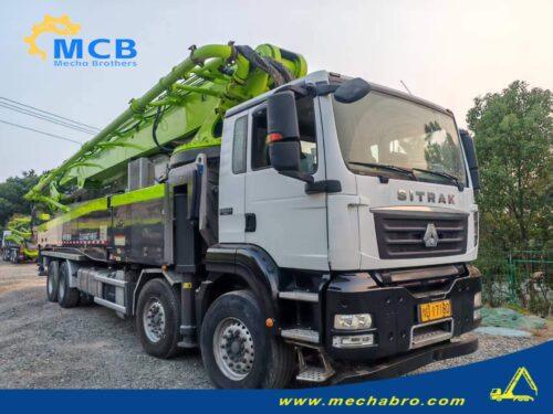 2022 Zoomlion 61.2m SITRAK pump truck — front-right view 2022 Zoomlion 61.2m concrete pump truck on SITRAK C7H chassis, front-right view