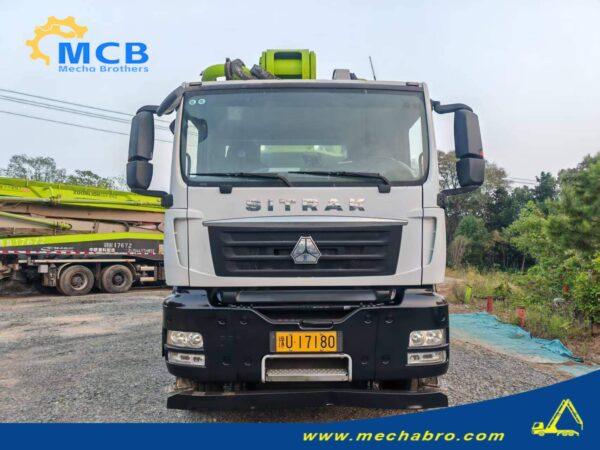 2022 Zoomlion 61.2m SITRAK pump truck — front view 2022 Zoomlion 61.2m concrete pump truck on SITRAK C7H chassis, front view