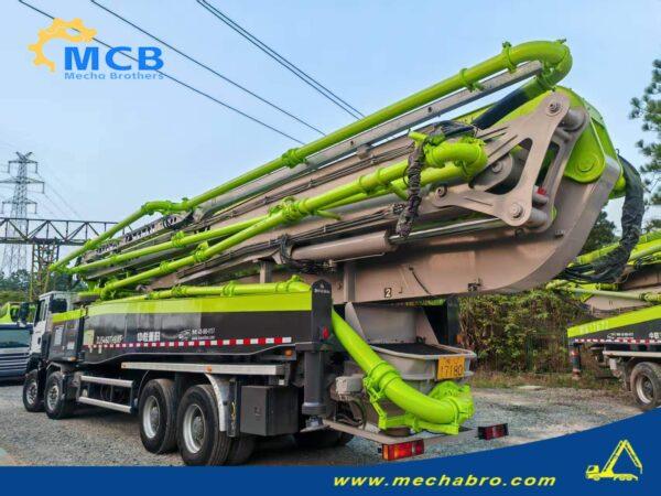 2022 Zoomlion 61.2m SITRAK pump truck — rear-left view with folded boom 2022 Zoomlion 61.2m concrete pump truck on SITRAK C7H chassis, rear-left view with folded boom