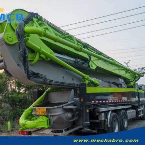 2022 Zoomlion 61.2m SITRAK pump truck — rear-right view with folded boom 2022 Zoomlion 61.2m concrete pump truck on SITRAK C7H chassis, rear-right view with folded boom