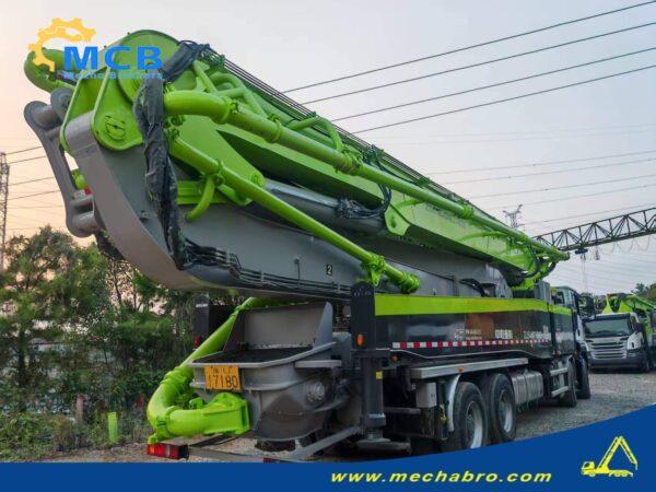 2022 Zoomlion 61.2m SITRAK pump truck — rear-right view with folded boom 2022 Zoomlion 61.2m concrete pump truck on SITRAK C7H chassis, rear-right view with folded boom